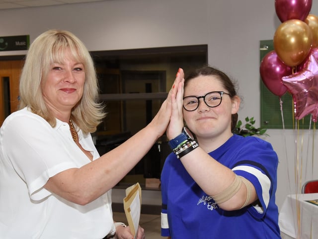 A high-five for great results at St Cecilia's College.