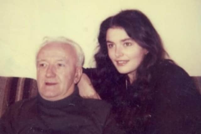 Roma, pictured with her father.
