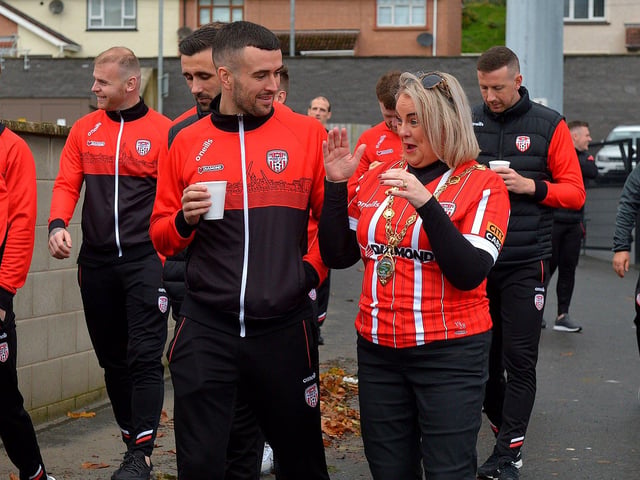Mayor Sandra Duffy chatting with Derry City’s Michael Duffy on Saturday morning prior to the team’s departure for Dublin ahead of tomorrow’s FAI Cup Final against Shelbourne. George Sweeney.  DER2244GS – 36