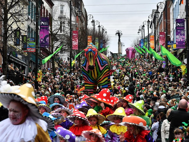 The Derry St Patrick’s Day parade makes its way towards the city centre on Monday afternoon. Photo: George Sweeney.