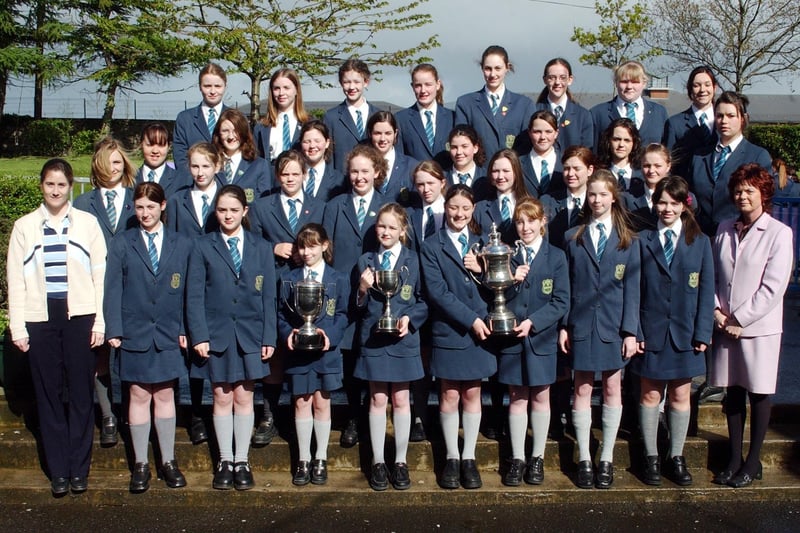 Thornhill College, winners of the Sacred Music, Post Primary, Youth Choir and the Michael Mason Trophy for the best performance for a school at Feis Dhoire Cholmcille. Included are Ms. Elizabeth Gallagher, music teacher, and Mrs. Siobhan McAteer. vice-principal. (1305C01)