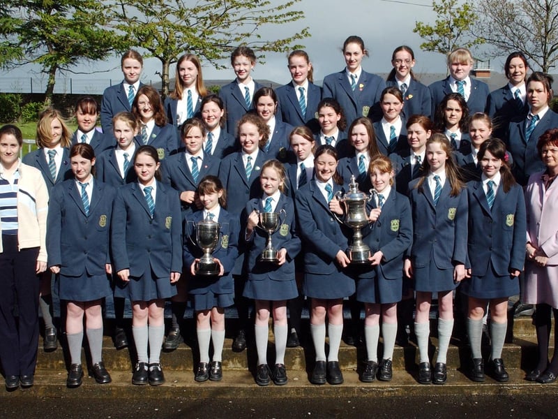 Thornhill College, winners of the Sacred Music, Post Primary, Youth Choir and the Michael Mason Trophy for the best performance for a school at Feis Dhoire Cholmcille. Included are Ms. Elizabeth Gallagher, music teacher, and Mrs. Siobhan McAteer. vice-principal. (1305C01)