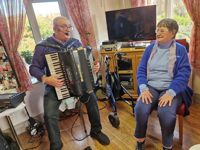 Musician Philip Wilson pictured with Gladys Kerr.