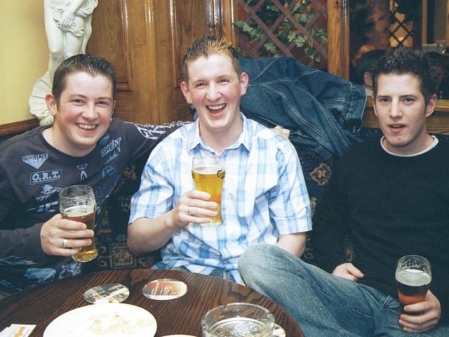 Cheer! Andy and Kevin McIntyre and Ronan Gallagher toast the health of Cóilín McCourt. 290503HG13