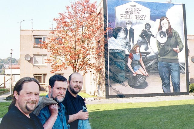 Bogside artists pictured shortly after completing the Bernadette Devlin mural in the Bogside in 1997.