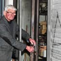 Soccer legend, eighty-six year old John ‘Jobby’ Crossan closes the door, for the final time, on his Sports Centre in Pennyburn on Friday. Photo: George Sweeney