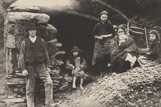 Millions of our Irish ancestors lived in dire poverty and millions scraped together what they could and emigrated to other shores and helped those countries thrive. Pictured is a family at the ruins of their house in Killarney back in 1888. Private Collection. (Photo by Fine Art Images/Heritage Images/Getty Images)