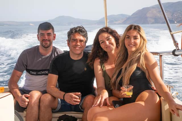 Karla Hall and her family on a boat trip to White Rocks Beach. Picture: Sam Pelly.