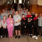 COUNTY DERRY BOXERS HONOURED. . . .The Mayor of Derry City and Strabane District Council making a presentation to Jim Knox, secretary, County Derry Boxing Board to mark their recent acknowledgement as the Team of the Tournament at the William Wallace Box Cup 2023 (Scotland), during a reception in the city's Guildhall on Thursday evening last. Included are club officials and boxers. (Photos: Jim McCafferty Photography)