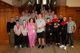 COUNTY DERRY BOXERS HONOURED. . . .The Mayor of Derry City and Strabane District Council making a presentation to Jim Knox, secretary, County Derry Boxing Board to mark their recent acknowledgement as the Team of the Tournament at the William Wallace Box Cup 2023 (Scotland), during a reception in the city's Guildhall on Thursday evening last. Included are club officials and boxers. (Photos: Jim McCafferty Photography)