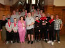 COUNTY DERRY BOXERS HONOURED. . . .The Mayor of Derry City and Strabane District Council making a presentation to Jim Knox, secretary, County Derry Boxing Board to mark their recent acknowledgement as the Team of the Tournament at the William Wallace Box Cup 2023 (Scotland), during a reception in the city's Guildhall on Thursday evening last. Included are club officials and boxers. (Photos: Jim McCafferty Photography)