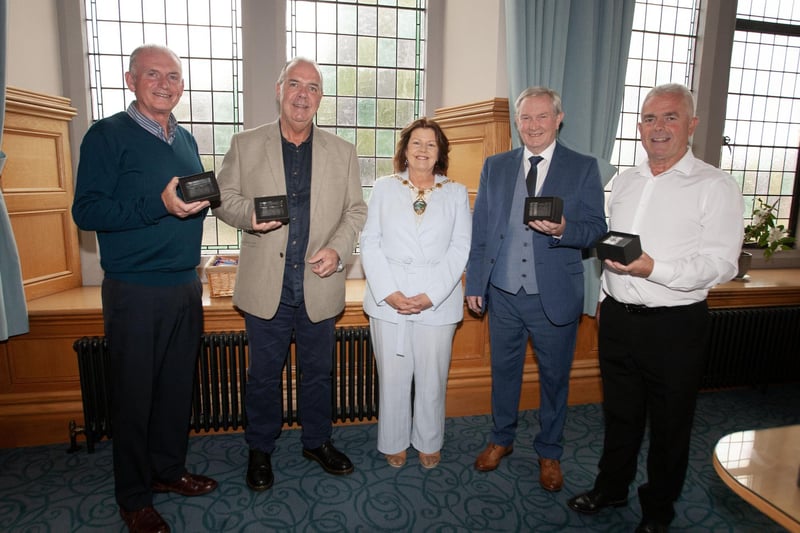 The Mayor of Derry City and Strabane District Council, Patricia Boyle pictured with drivers from Translink who have retired after clocking up 187 years between five of them, during a reception in their honour at the Guildhall on Thursday evening.  From left, Trevor Tracy, Andy McGillan, Jim Kelly and Vincent Morrison. Missing from photo is George Curry. (Photos: JIm McCafferty Photography)