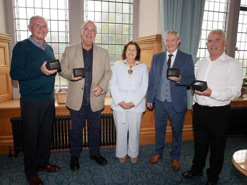 The Mayor of Derry City and Strabane District Council, Patricia Boyle pictured with drivers from Translink who have retired after clocking up 187 years between five of them, during a reception in their honour at the Guildhall on Thursday evening.  From left, Trevor Tracy, Andy McGillan, Jim Kelly and Vincent Morrison. Missing from photo is George Curry. (Photos: JIm McCafferty Photography)
