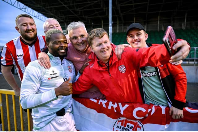 Dipo Akinyemi of Derry City with supporters after the Sports Direct Men’s FAI Cup second round match between Treaty United and Derry City at Markets Field in Limerick. Photo by Stephen McCarthy/Sportsfile