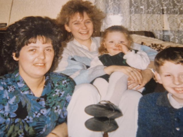 Margaret, pictured on left, with members of her family, wearing an NHS hairpiece after undergoing her transplant in the 1980s.