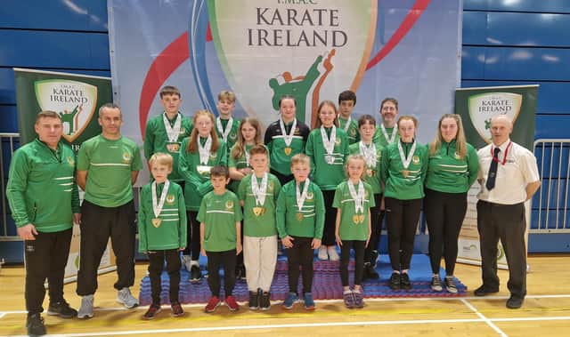 ALL-IRELAND CHAMPIONS: Pictured, from left to right, Martin McCole (Head Kumite Coach), Seamus Gillespie (Instructor), Daniel Moynihan, Caolan Caulfield (Coach), Bebhinn McCole, Patrick Gillespie, Patrick Moynihan, Vanessa Cuffe, Jamie Cuffe, Catriona McKinney, Jack Walker, Lara Walker, Michael Gillespie, Damica Dowds, Harry McDaid Joe McDaid, Aine McCole (Coach), Erin McCole (Coach) and Denis Donaghey (Instructor and WUKF Referee).