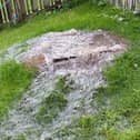 Sewage cascading into the garden of a house in Ivy Mead Mews in Derry after a pipe burst recently. NI Water say they are working on a permanent solution to the problem.