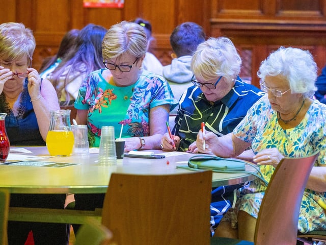 The Mayor Councillor Lilian Seenoi-Barr has once again hosted an Our Guildhall Our Space event for younger and older people in April with entertainment from In Your Space Circus School, Black Paddy, Richie Remo and DJ Tyree Patton. Picture Martin McKeown. 12.04.25 : Pictured are guests at the Mayor's penultimate Our Guildhall, Our Space in Derry.