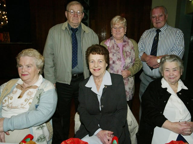 Mary Able, Lila Mullan and Bridie McCay with Peter Whelan, Anna Whelan and Don O'Rielly at the SVDP Christmas party at St. Mary's Community Centre, Creggan. (0512JB73):.