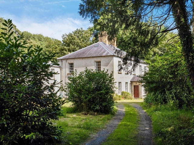 Brookhill House, 33 Ardlough Road is for sale at £650,000. The detached country residence was built around 1795 and comes with 35 acres of land. The house boasts seven bathrooms, three reception rooms and three bathrooms.:Brookhill House on the Ardlough Road.