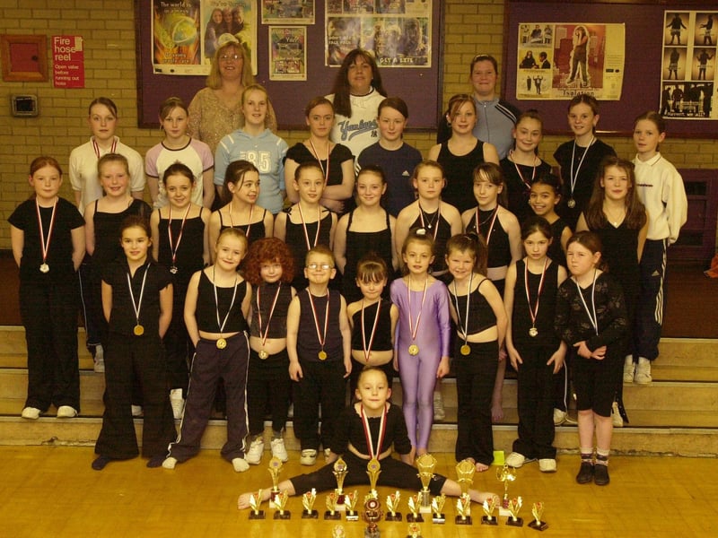 The Dance Sensation group at Shantallow Youth Centre who won an array of trophies and medals at the Clonmany disco dancing competition. Included, back row from left, are coached Denise McLaughlin, Estelle Grant, and Michelle McCleary.