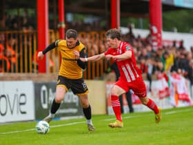 Derry City winger Ryan Graydon races past Sligo Rovers goalscorer Will Fitzgerald at the Showgrounds on Saturday night. Photograph by Kevin Moore.