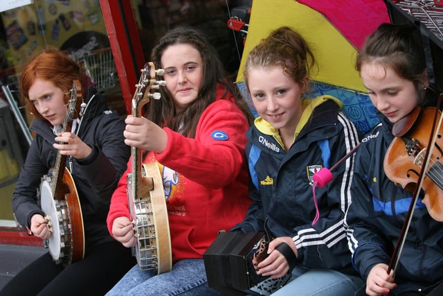 FOUR FRIENDS FROM CAVAN!. . . .These four young ladies were captured playing in Waterloo Place on Thursday afternoon. From left, Ciara Brady, Sinead McDonald, Orla Brady and Niamh Brady. DER3313JM091