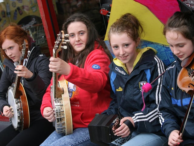 FOUR FRIENDS FROM CAVAN!. . . .These four young ladies were captured playing in Waterloo Place on Thursday afternoon. From left, Ciara Brady, Sinead McDonald, Orla Brady and Niamh Brady. DER3313JM091