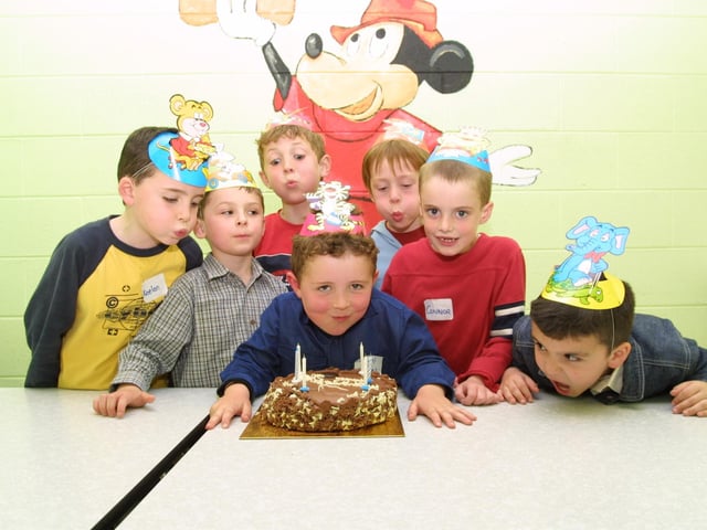 Ryan gets some help from his friends to blow out his candles
