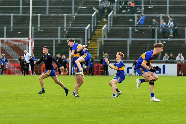 Naomh Padraig players celebrate winning the Ulster GAA Junior Club Championship final, after defeating Craigbane in Celtic Park on Saturday afternoon. Photo: George Sweeney