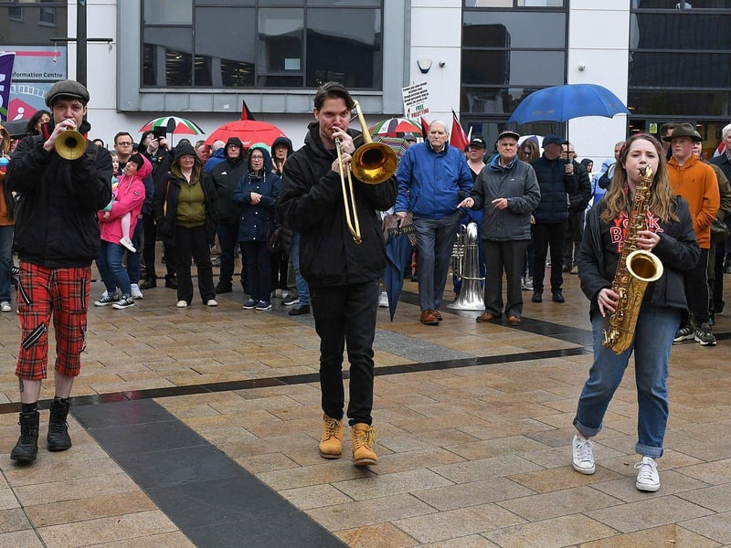 The New York Brass Band performs in Waterloo Place on Saturday. Photo: George Sweeney