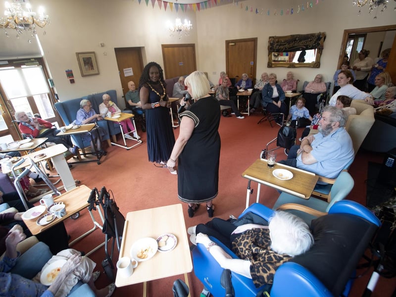 Louise Carroll, Care Home Manager, introducing the Mayor to some of the residents during Thurday's 25th anniversary of Longfield Care Home.