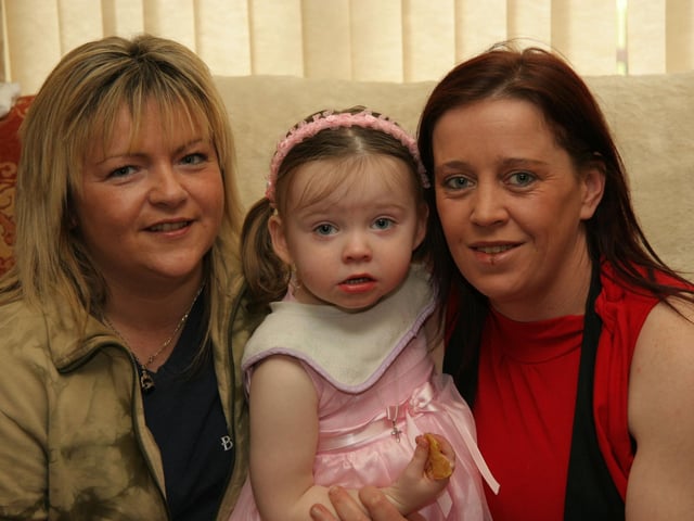 Orlaigh pictured with her mum Ann and Godmother Maureen on the occasion of her 2nd birthday 0035JML : Parties and celebrations April 2006: Orlaigh Kelly.