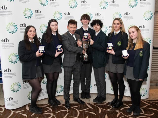 Director of Schools Dr Martin Gormley presents Crana College with the Donegal ETB Debate Forum Cup at the Donegal ETB inaugural  school’s debating competition in the Radisson Hotel Letterkenny. Photo Clive Wasson
