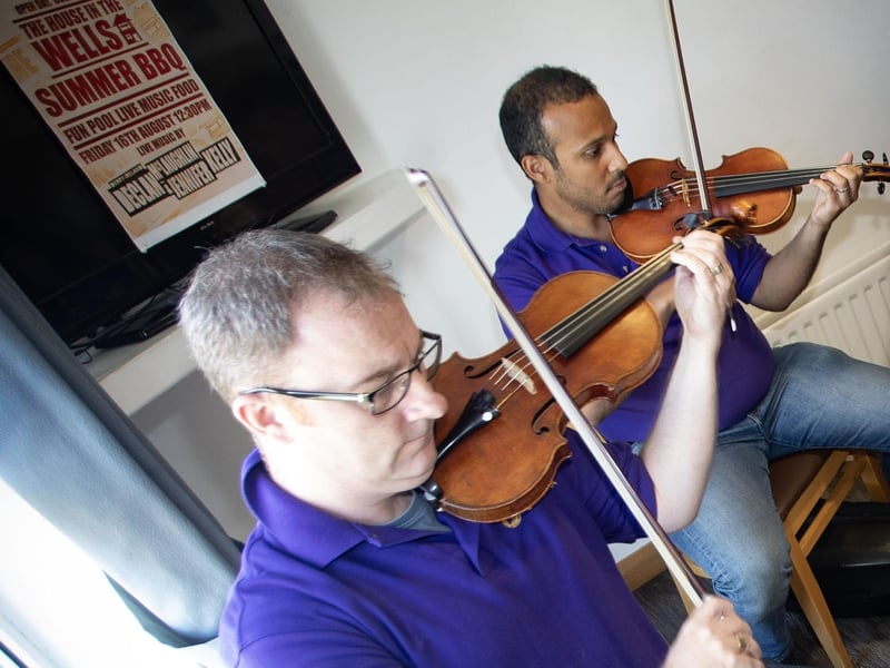 Members of the Ulster Orchestra entertaining residents and staff at The House in the Wells on Tuesday as part of Féile 24. (Photos: Jim McCafferty Photography)