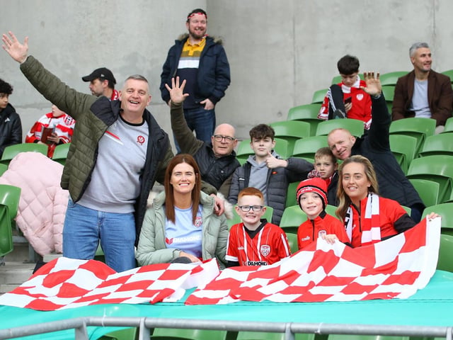 These Derry City fans spotted our photographer as they get ready for what was an unforgettable performance from their team.