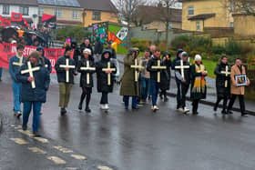 Relatives carrying white crosses lead the Bloody Sunday 51 commemoration march along Rathlin Drive on Sunday afternoon.  Photo: George Sweeney. DER2306GS – 23