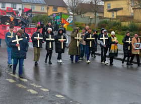 Relatives carrying white crosses lead the Bloody Sunday 51 commemoration march along Rathlin Drive on Sunday afternoon.  Photo: George Sweeney. DER2306GS – 23