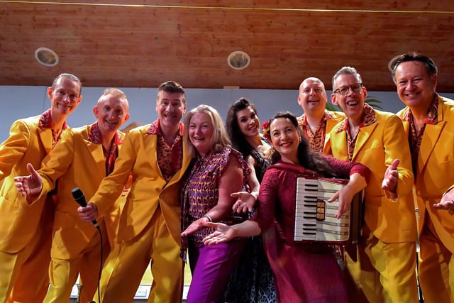 Geraldine O’Connor, principal St John’s Primary School, pictured with the Jive Aces during a visit to the school on Thursday afternoon. Photo: George Sweeney.  DER2317GS – 37