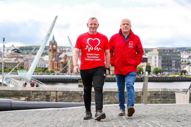 Alex Magee from Derry is taking on a one million step challenge for British Heart Foundation NI. The 46-year-old University lecturer suffered 2 cardiac arrests and is now walking the equivalent distance of the length and breadth of Ireland, approximately 470 miles during July and August to raise funds for BHF NI and is encouraging people in the local community to join him. Pictured with Alex is Fearghal McKinney, head of BHF NI.