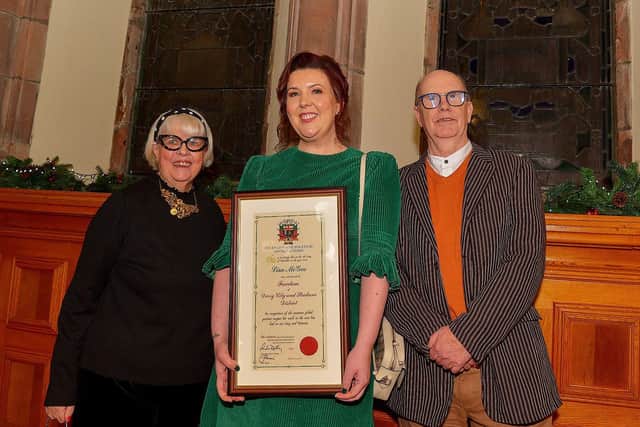 Lisa McGee, creator of Derry Girls, pictured with her parents Anne and Chris after she was conferred with the Freedom of Derry City and Strabane by a meeting of Full Council on Monday evening in the Guildhall. Photo: George Sweeney. DER2249GS