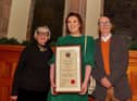 Lisa McGee, creator of Derry Girls, pictured with her parents Anne and Chris after she was conferred with the Freedom of Derry City and Strabane by a meeting of Full Council on Monday evening in the Guildhall. Photo: George Sweeney. DER2249GS