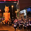 The ‘Carnival of the Dead’ Halloween parade makes its way along Strand Road.  Photo: George Sweeney