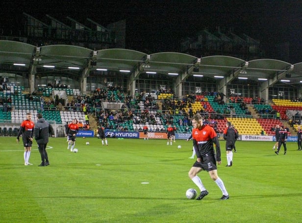Derry City players warm-up in Tallaght Stadium ahead of Sunday night's defeat to Shamrock Rovers.