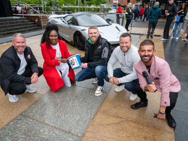 Organisers Gary McCaul and Stephen McCaul with compere Michael Doherty and Derry City and Strabane District Council Mayor, Councillor Lilian Seenoi-Barr and Gavin Melly from BUD Club as she  hosted Supercar Saturday in Guildhall Square to raise money for the Mayoral Charity Bud Club. The event attracted car enthusiasts and owners from across the region to support aid the local charity. Picture Martin McKeown. 24.05.25