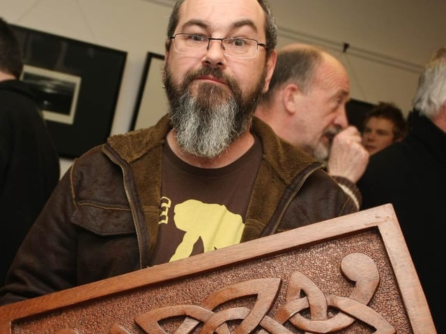 Sean Gallagher, with one of his carvings on show, during the end of term exhibition, at the Eden Arts Centre. 0604GM06EDEN