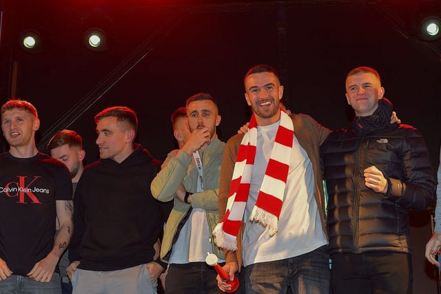 Derry City players celebrate Sunday’s FAI Cup victory over Shelbourne in the Guildhall Square on Monday night. Photo: George Sweeney.  DER2244GS – 050