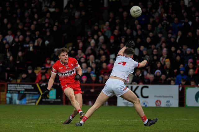 Ethan Doherty of Derry scores a point against Tyrone. Photo: George Sweeney