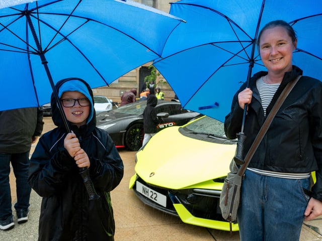 Harrison Mitchel with his mum Gillian Lindsay Derry City and Strabane District Council Mayor, Councillor Lilian Seenoi-Barr has hosted Supercar Saturday in Guildhall Square to raise money for the Mayoral Charity Bud Club. The event attracted car enthusiasts and owners from across the region to support aid the local charity. Picture Martin McKeown. 24.05.25