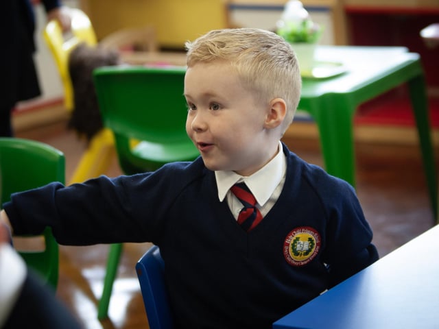 Enjoying his first day at school.